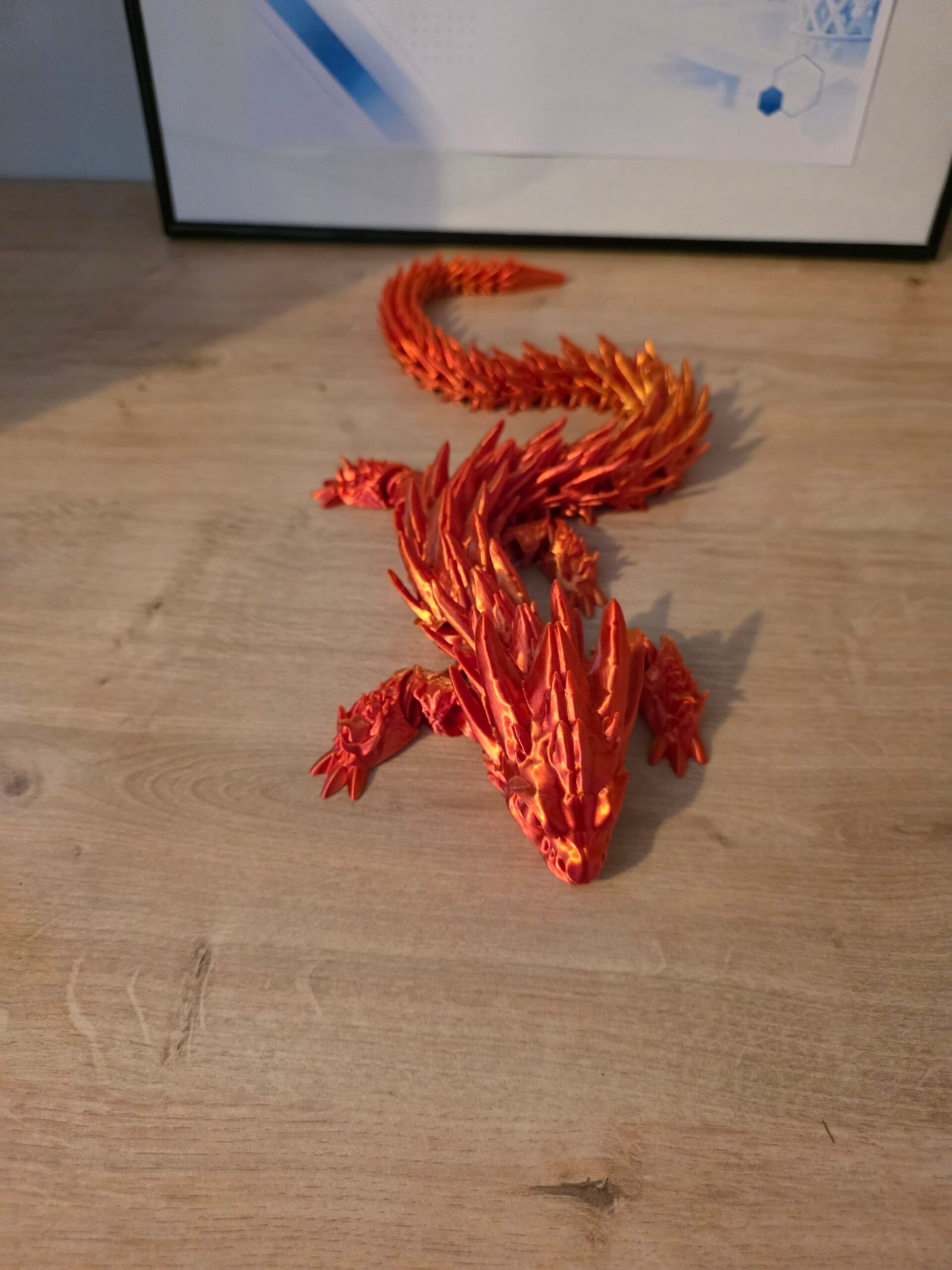 Red and gold articulated Crystal Dragon viewed from above
